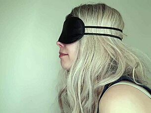 Blindfolded friend's wife tricked in a taste game