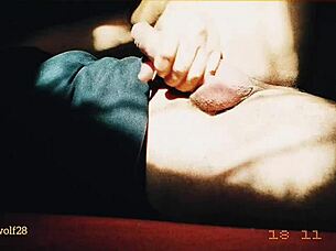 Bad Wolf28 gives handjob to big cock at sunset