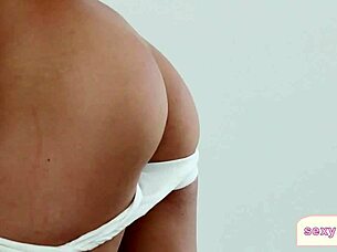 hot blonde playboy babe strips in bedroom