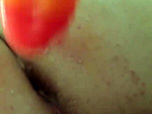 Fella stuck a whole rainbow dildo into tight anal hole