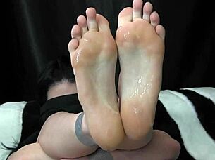 Femdom gives footjob with her fetish feet