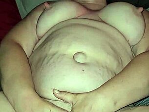 She stimulates herself until she reaches a strong climax