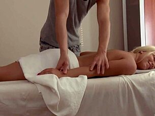 A big-dicked masseur massages blonde mya ls pussy on her fours 😏