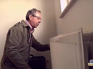 Blonde woman engages with older man in intimate encounter