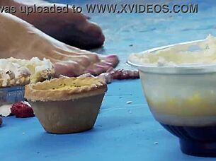 lesbian blondes rub food on their big tits and asses and lick each other before using sex toys