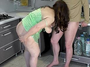 Stepmom with big tits gives blowjob and spreads ass