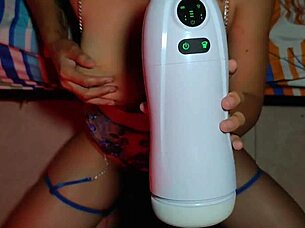 Helping boyfriend with new toy in intimate session