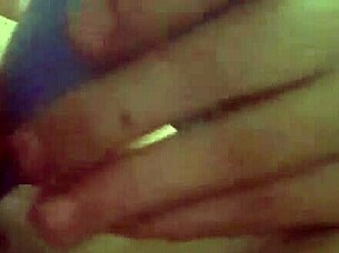 She fucks herself with a dildo