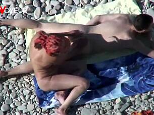 Beach voyeur catches busty cougar milf fucked by young guy!