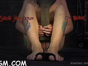 charming blonde floosy getting pleasured by a sex toy in bondage