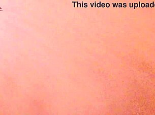 Asian girl enjoys a passionate moment alone in her bedroom