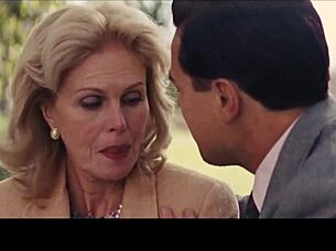 A milf shares a kiss with a brunette and blonde in missionary position.