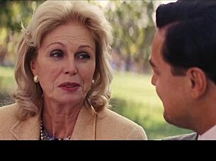 A milf shares a kiss with a brunette and blonde in missionary position.