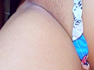 Asian girl enjoys a passionate moment alone in her bedroom