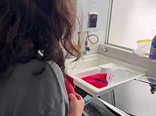 Look at these two lesbians having silent sex in the kitchen!