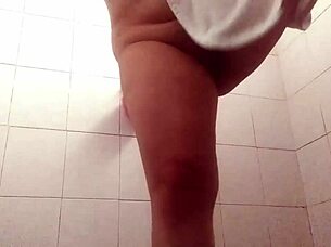 Watch this chubby milf with big tits shower and exhibit herself!