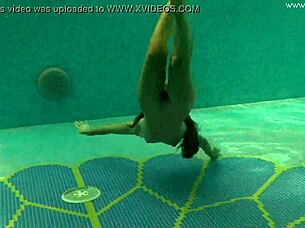 Irina Russaka shows petite body underwater solo