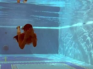 Irina Russaka shows petite body underwater solo