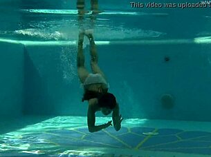 Irina Russaka shows petite body underwater solo