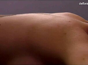 jennifer lorentz gives a hot massage to a virgin babe, touching her pussy.