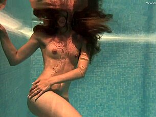 Irina Russaka shows petite body underwater solo