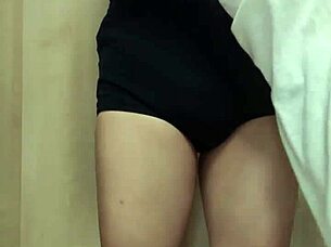 Asian maid in uniform with buttplug