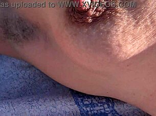 Why does this hairy milf let a pervert cum on her pussy on the french beach?