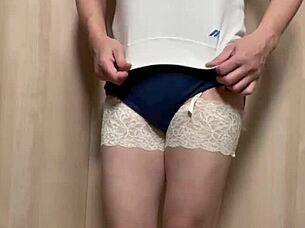 Asian maid in uniform with buttplug