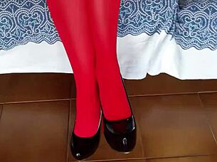 The milf with beautiful legs in red pantyhose and black heels walked confidently.