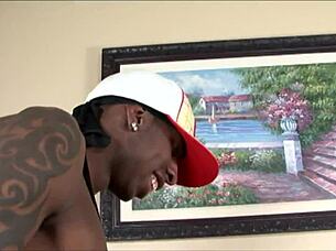 Brunette MILF sucks big black cock.