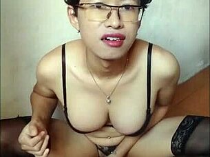 Amateur shemale in black bra and stockings cums on handkerchief