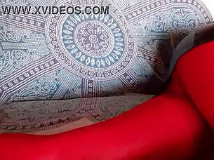 The milf with beautiful legs in red pantyhose and black heels walked confidently.