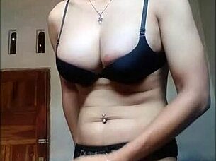 Amateur shemale in black bra and stockings cums on handkerchief