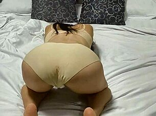 Student Does Booty Workout In Panties On Bed During Photoshoot
