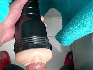 Black Cock Pounds Fleshlight Hard After Cold Shower In Steamy Scene.