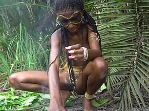 hot african native woman cooking in the jungle kitchen