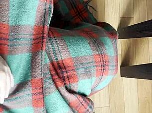 My shy neighbor performs cunnilingus under the blanket in this homemade lesbian scene.