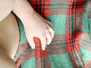 My shy neighbor performs cunnilingus under the blanket in this homemade lesbian scene.