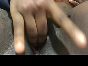 Black Woman Masturbates Her Wet Pussy Solo