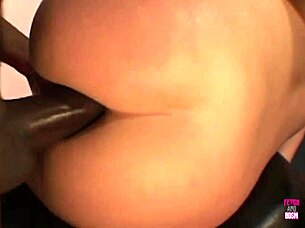 Blonde enjoys interracial sex with big cock in ass