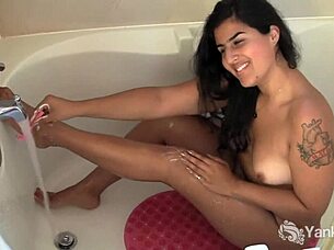 Brunette Miel Shaves Legs In Shower