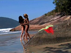 Young Lesbians Lick and Toy Tight Pussies on Seaside