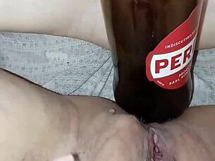 gretala, pregnant and excited, rubs a bottle on her pussy