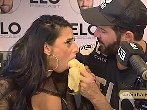 rainha hotwife gives a sloppy blowjob to the presenter on the podcast