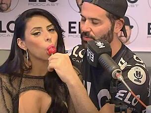 rainha hotwife gives a sloppy blowjob to the presenter on the podcast