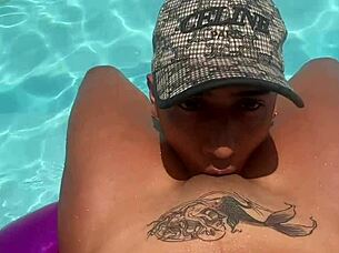 Stranger massages latina babe's wet pussy and natural tits in hotel pool