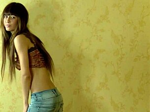 horny young brunette massages shaved pussy!