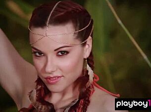 Inked Teen Elizabeth Marx Strips Massive Tits In Tropical Forest