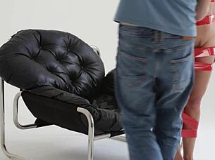 blonde playboy girl gets tied up with red tape backstage