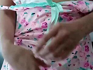 Beautiful latina model poses in pink pajamas